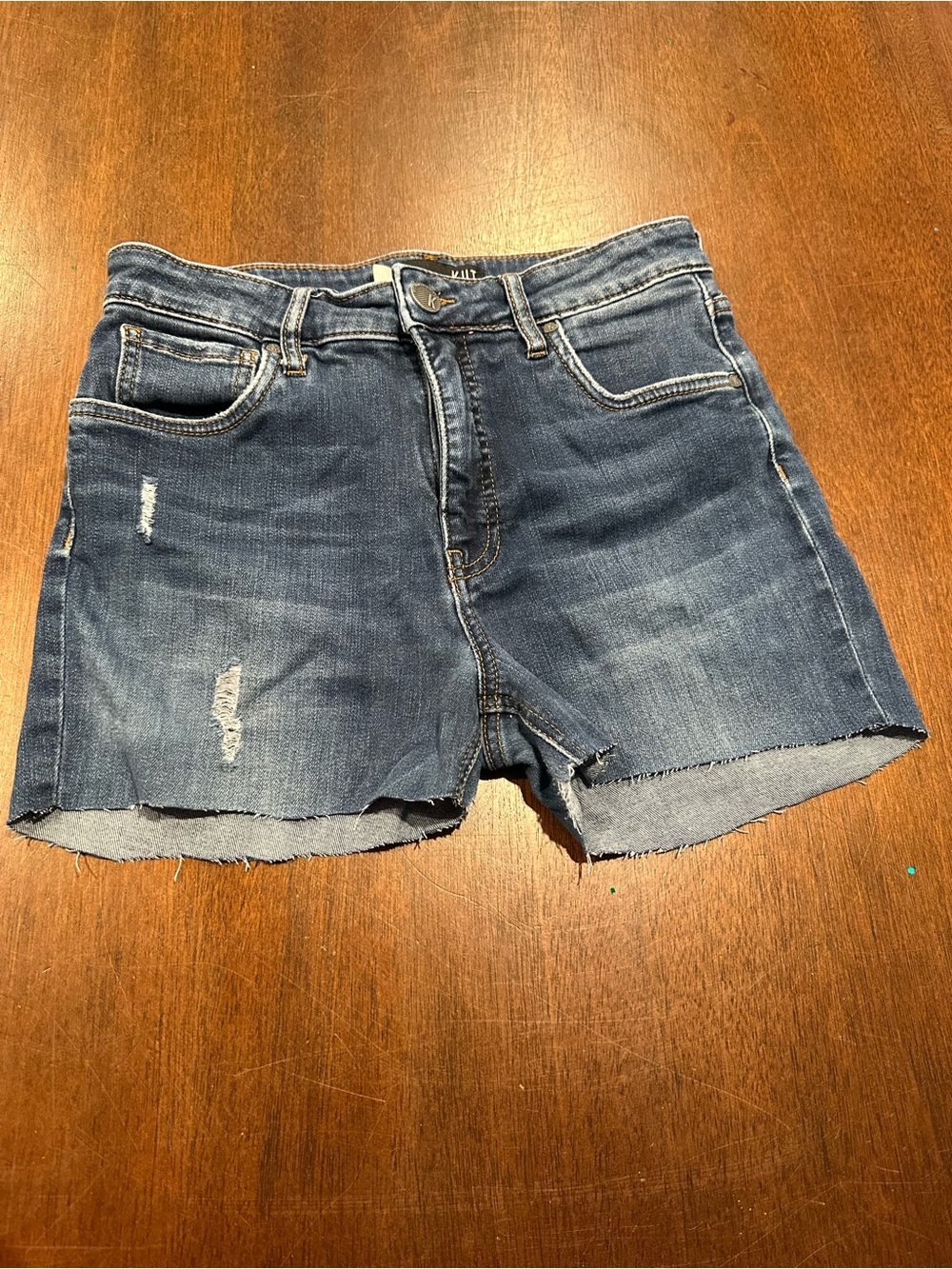 Women's Distressed Denim Shorts in Blue size 6